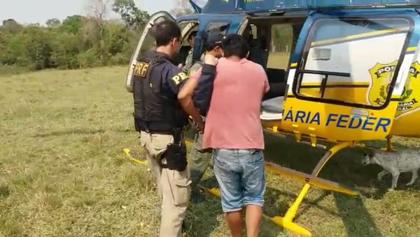 Dois homens foram presos durante investigação (Foto: Polícia Rodoviária Federal/Divulgação)