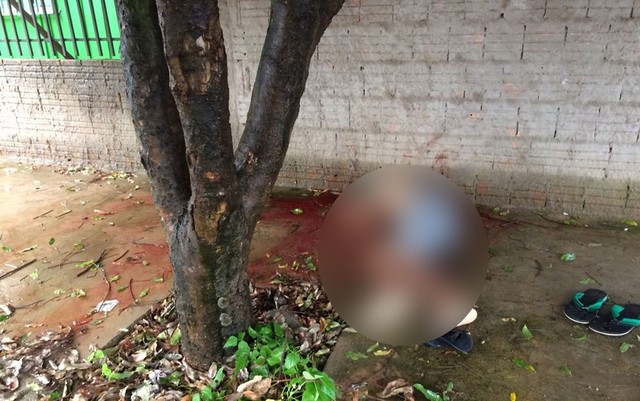 Menino, de 14 anos, foi encontrado morto em uma calçada, em Sinop (Foto: José Carlos Araújo/GC Notícias).