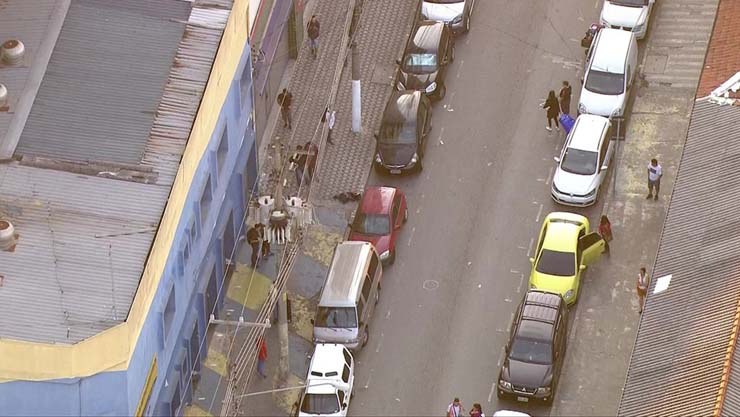 Guarda civil morre após ser baleado nesta madrugada na região do Brás — Foto: Reprodução TV Globo.