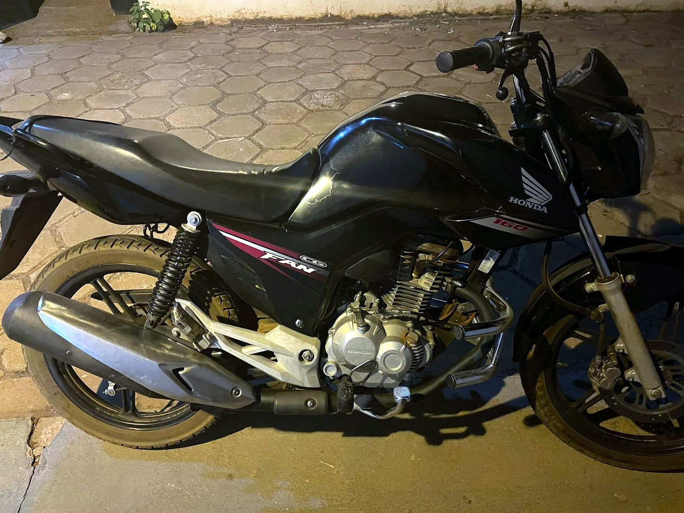 Motocicleta, marca Honda CG Fan 160, preta, ano 2017, furtada em 18/07/22